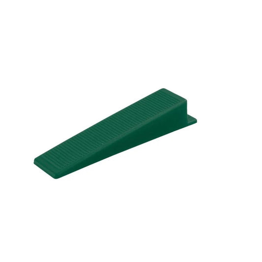 Green wedge-shaped plastic door stop with rubber base